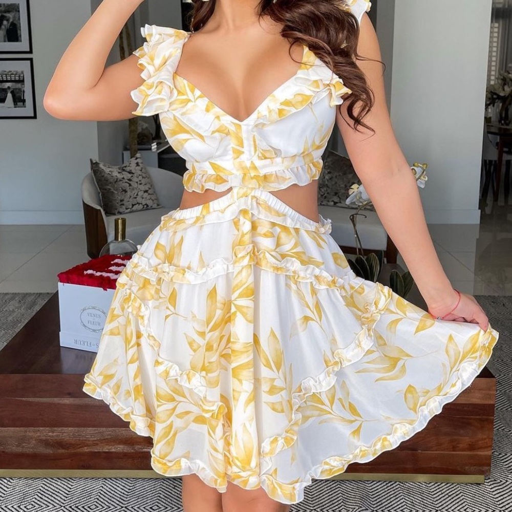 Yellow and white patterned dress from The Boutique!
